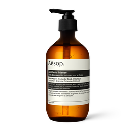 Aesop Antithesis Intense Body Cleanser pump bottle on a light background.